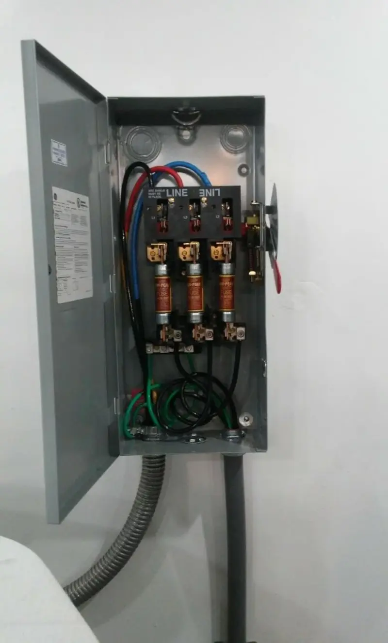 Three-phase disconnect switch installed for Smoke Detector Installation in Covington